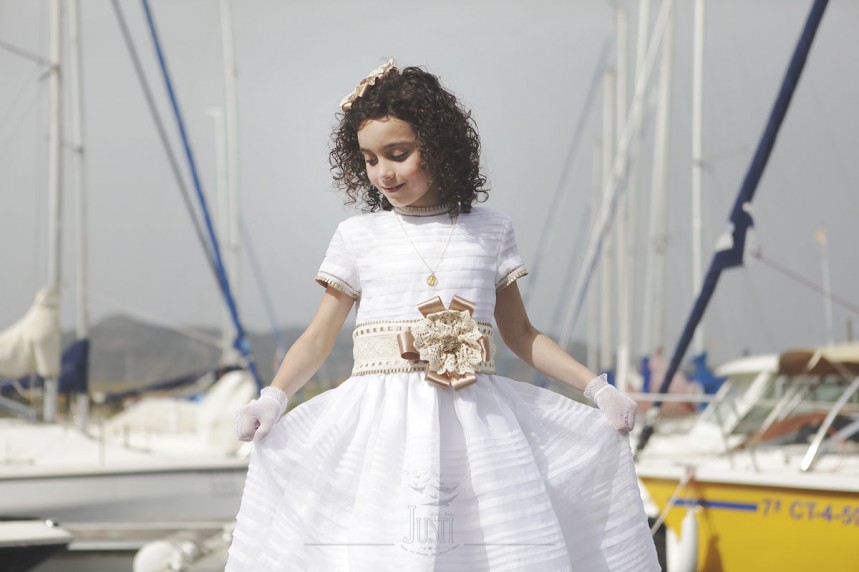 fotos profesionales de comunion niña orellana la vieja embarcadero barcos